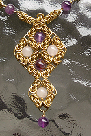 amethyst and rosequartz spiritual pendant